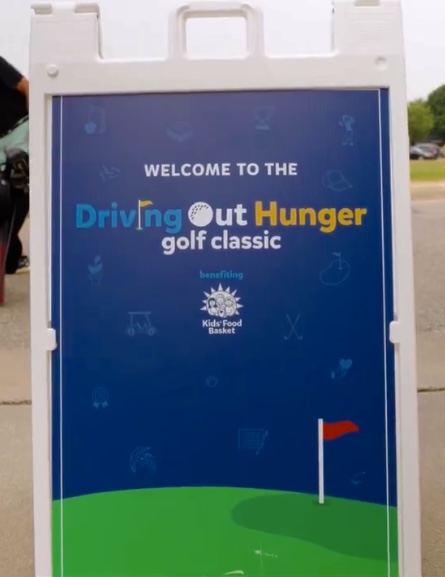 Charity golf event sign