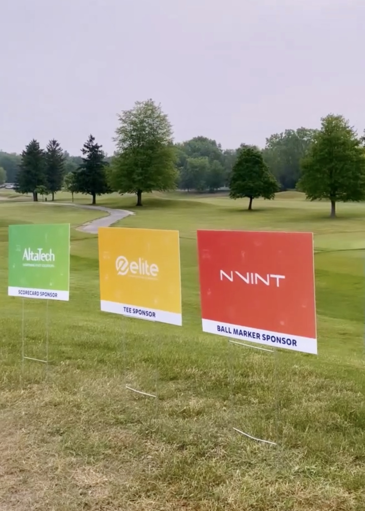 Charity golf event signs